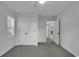 Bright bedroom features grey carpet and an ensuite bathroom at 101 Bent Tree Ln., Pawleys Island, SC 29585