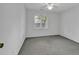 Spacious bedroom with grey carpet and a ceiling fan at 101 Bent Tree Ln., Pawleys Island, SC 29585