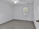 Spacious bedroom with grey carpet and large window at 101 Bent Tree Ln., Pawleys Island, SC 29585