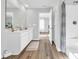 Modern bathroom with white vanity, tub and shower at 109 Foxford Dr., Conway, SC 29526