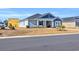 Two-story house with gray and blue siding, landscaped yard at 109 Foxford Dr., Conway, SC 29526