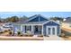 Gray and blue siding house with double front doors at 109 Foxford Dr., Conway, SC 29526