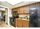 Efficient kitchen with granite countertops and black appliances at 1105 S Ocean Blvd. # 516, Myrtle Beach, SC 29577