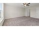 Neutral bedroom featuring carpet, a ceiling fan, and bright natural light at 112 Lakota Loop, Longs, SC 29568