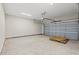 Spacious two-car garage with automatic door opener and sealed concrete floors at 112 Lakota Loop, Longs, SC 29568