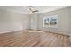 Inviting living room with hardwood floors and a bright window at 112 Lakota Loop, Longs, SC 29568