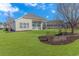 Landscaped backyard with spacious patio and great view at 113 Barn Owl Ct., Carolina Shores, NC 28467