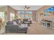 Spacious living area with a comfortable sectional sofa and ample natural light at 113 Barn Owl Ct., Carolina Shores, NC 28467