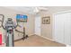 Home office or exercise room with stationary bike and TV at 113 Barn Owl Ct., Carolina Shores, NC 28467