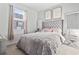 Spacious bedroom with plush bed and elegant decor at 1164 Maxwell Dr., Little River, SC 29566