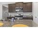 Modern kitchen featuring stainless steel appliances and granite countertops at 1164 Maxwell Dr., Little River, SC 29566