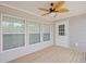 Covered back porch with wood flooring, a ceiling fan, and an exit door at 122 Willie Mays Pl., Aynor, SC 29511