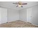 Clean and comfortable bedroom with light wood-look floors and neutral walls at 122 Willie Mays Pl., Aynor, SC 29511