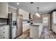 Modern kitchen with island, stainless steel appliances, and granite countertops at 122 Willie Mays Pl., Aynor, SC 29511