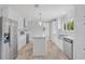 Modern kitchen with stainless steel appliances, island, and ample counter space at 122 Willie Mays Pl., Aynor, SC 29511