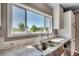 Stainless steel kitchen sink with granite countertop and window view at 122 Willie Mays Pl., Aynor, SC 29511