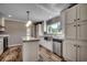 Modern kitchen with stainless steel appliances and granite countertops at 122 Willie Mays Pl., Aynor, SC 29511