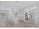 Open-concept living room with a view into the kitchen and luxury vinyl plank flooring at 122 Willie Mays Pl., Aynor, SC 29511