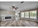 Spacious living area with wood-look floors and built-in shelving at 122 Willie Mays Pl., Aynor, SC 29511