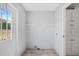 Mudroom with white cabinets and a door leading to the outside at 122 Willie Mays Pl., Aynor, SC 29511