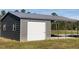 Metal storage shed with covered parking area at 122 Willie Mays Pl., Aynor, SC 29511