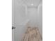 Walk-in closet with wire shelving installed and luxury vinyl plank flooring at 122 Willie Mays Pl., Aynor, SC 29511