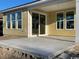 Large concrete patio with sliding glass doors at 1253 Lady Bird Way, North Myrtle Beach, SC 29582