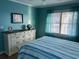 Bedroom with large window and striped bedding at 130 Easy St., Murrells Inlet, SC 29576