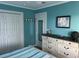 Bedroom with dresser, mirror and coastal art at 130 Easy St., Murrells Inlet, SC 29576