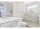 Bathroom with a walk-in shower and white vanity at 1303 S Ocean Blvd., North Myrtle Beach, SC 29582