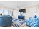 Coastal living room with ocean views and comfy seating at 1303 S Ocean Blvd., North Myrtle Beach, SC 29582