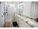 Elegant bathroom with double vanity, marble shower, and modern fixtures at 132 Serenity Point Dr., Little River, SC 29566