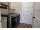 Spacious laundry room with new washer and dryer at 132 Serenity Point Dr., Little River, SC 29566