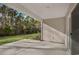 Covered patio with view of backyard and trees at 1454 Jardine Loop, Little River, SC 29566