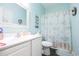 Clean bathroom with white vanity, shower, and seashell-themed decor at 149 Westhaven Dr. # B13, Myrtle Beach, SC 29579