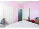 Pink bedroom with double doors and a walk-in closet at 149 Westhaven Dr. # B13, Myrtle Beach, SC 29579