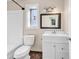 Clean bathroom, featuring a white vanity and stained glass window at 1553 Landing Rd., Myrtle Beach, SC 29577