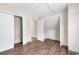 Bedroom with wood-look floors and walk-in closet at 1553 Landing Rd., Myrtle Beach, SC 29577