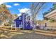 Purple house with deck and fenced yard at 1553 Landing Rd., Myrtle Beach, SC 29577