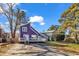 Purple house with deck and driveway at 1553 Landing Rd., Myrtle Beach, SC 29577