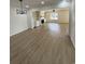 Open dining area with wood-look flooring and chandelier at 1674 Citadel Ln., Myrtle Beach, SC 29577