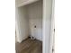 Bright laundry room with washer and dryer hookups, and built-in shelving at 1674 Citadel Ln., Myrtle Beach, SC 29577