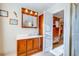 Bathroom with wooden vanity and access to bedroom at 1751 Gibson Ave., Surfside Beach, SC 29575