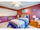 Cozy bedroom with a nautical theme and built-in shelving at 1751 Gibson Ave., Surfside Beach, SC 29575