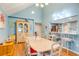 Bright dining room with kitchen views and a large wooden hutch at 1751 Gibson Ave., Surfside Beach, SC 29575