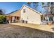 House exterior showcases a side view with a large yard and additional structures at 1751 Gibson Ave., Surfside Beach, SC 29575