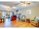 Bright living room featuring hardwood floors, fireplace, and ample natural light at 1751 Gibson Ave., Surfside Beach, SC 29575