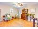 Bright living room with hardwood floors and a charming wooden hutch at 1751 Gibson Ave., Surfside Beach, SC 29575