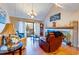 Living room with vaulted ceiling, fireplace and comfy seating at 1751 Gibson Ave., Surfside Beach, SC 29575