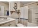 Clean bathroom with shower/tub combo, and white cabinetry at 1811 Berkley Village Loop, Myrtle Beach, SC 29579